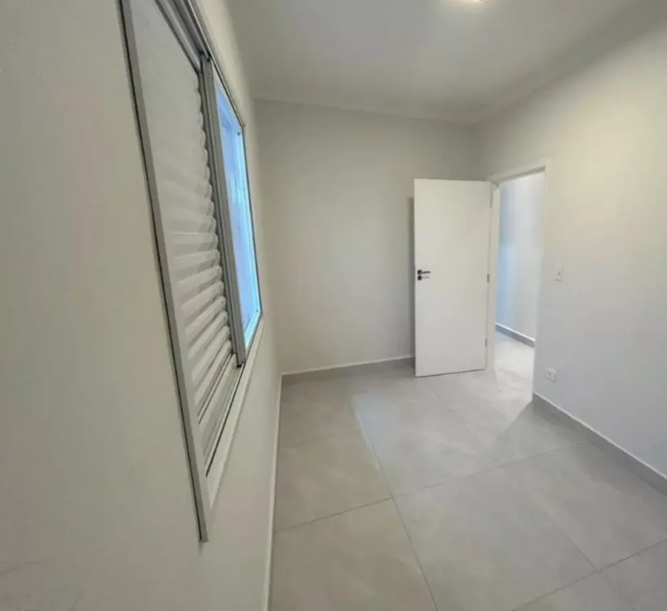 Casa térrea geminada alto padrão na Guilhermina, a 400 m do mar — foto 12