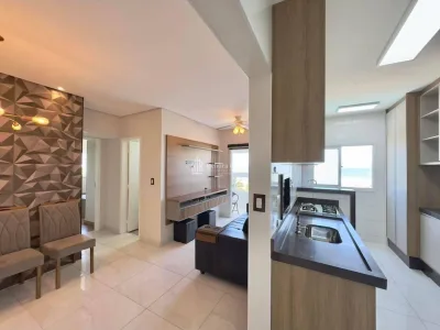 Frente Mar- 2 dorm - 1 suíte - sacada gourmet - mobiliado - 1 vaga R$670 Mil.