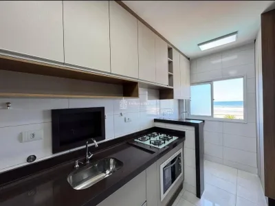 Frente Mar- 2 dorm - 1 suíte - sacada gourmet - mobiliado - 1 vaga R$670 Mil.