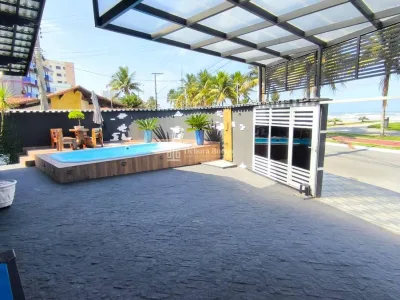 CASA COM PISCINA FRENTE MAR !!! 3 DORMITORIOS OTIMA LOCALIZAÇÃO