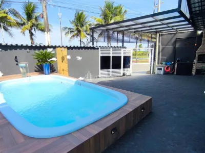 CASA COM PISCINA FRENTE MAR !!! 3 DORMITORIOS OTIMA LOCALIZAÇÃO