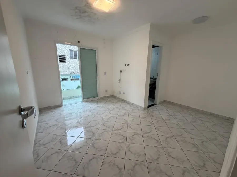 Casa 4 dormitórios com suíte para alugar em Canto do Forte, Praia Grande - 132 m²